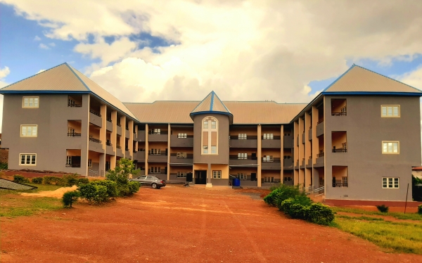 Conducive E- shaped school building with standard rails and connectivity